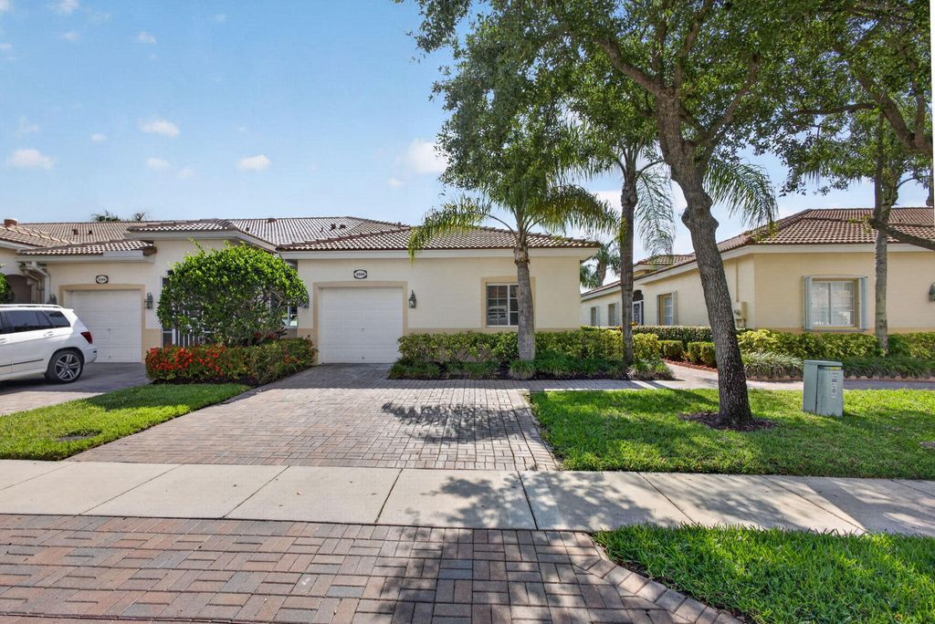 Photo of 2344 Windjammer Way, West Palm Beach, FL 33411 (MLS # B26028136)