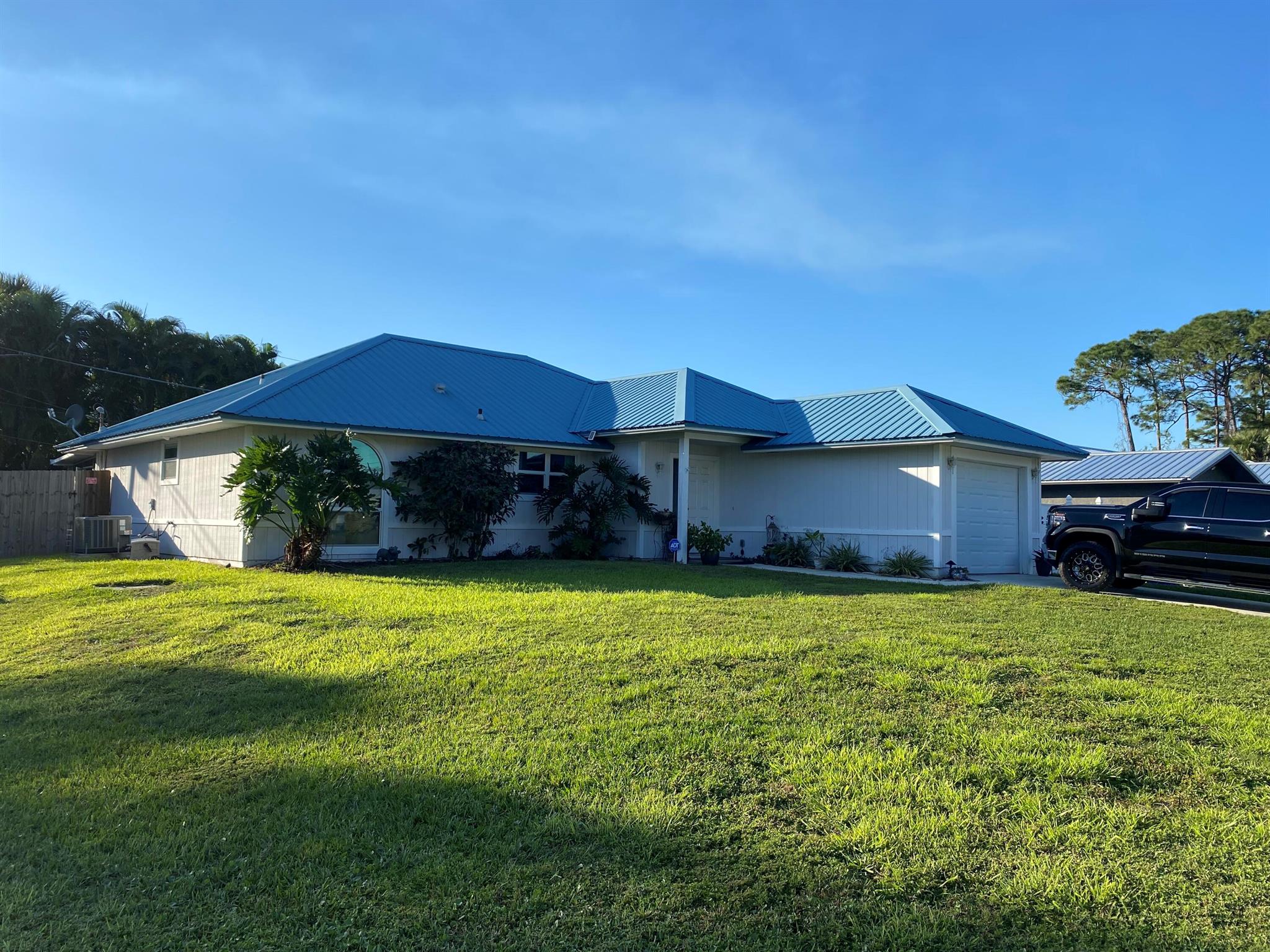 3 bedroom/ 2 bath home in Palm City on a quiet street. No HOA and no vehicle restrictions. Walking distance to Palm City Elementary. Fenced back yard and screened patio. Lap pool. Tile throughout. Most windows impact, city water, septic, AC replaced in 2020. 1 car garage. 3200/month. Rent includes pool service. First month and double security deposit required. Dogs welcome.50$ pet fee per month per dog, breed subject to approval. No cats. Dog and renter liability insurance required. All background checks and income verification via email link $45 total per adult.3x rent verified income. Some photos are virtually staged. Send Contract to lease to start process.