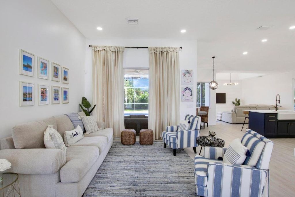 Photo of 519 N Cypress Drive, Tequesta, FL 33469 (MLS # R10968635)