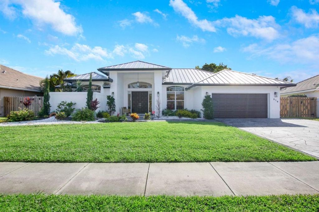 Photo of 519 N Cypress Drive, Tequesta, FL 33469 (MLS # R10968635)