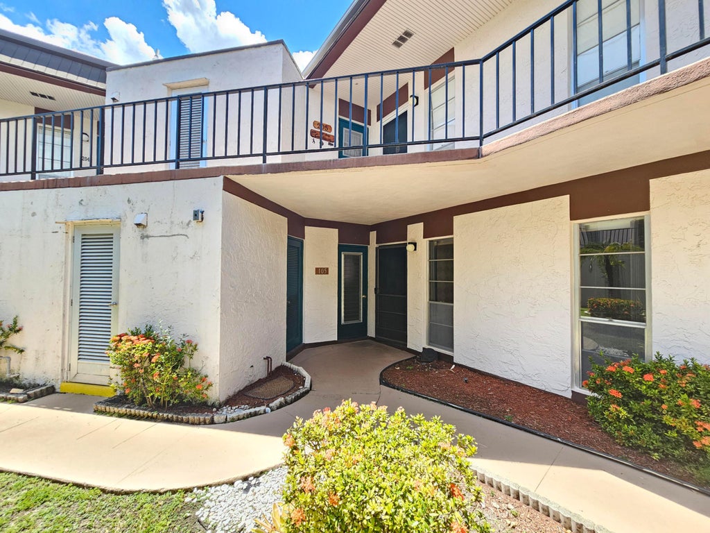 Photo of 6 GREENWAY Village N #105, Royal Palm Beach, FL 33411 (MLS # B26070136)