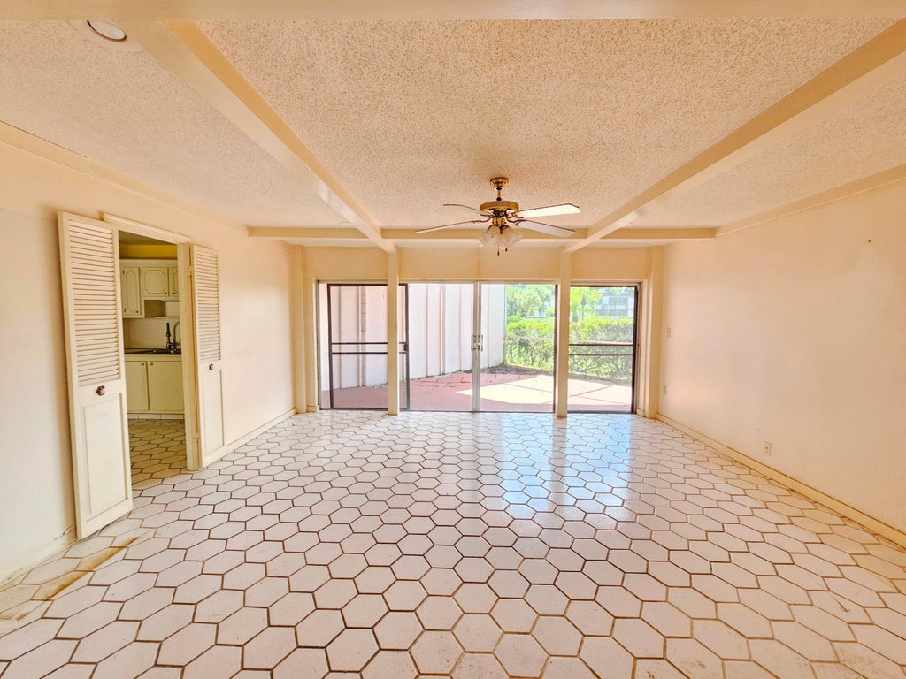 Photo of 6 GREENWAY Village N #105, Royal Palm Beach, FL 33411 (MLS # B26070136)