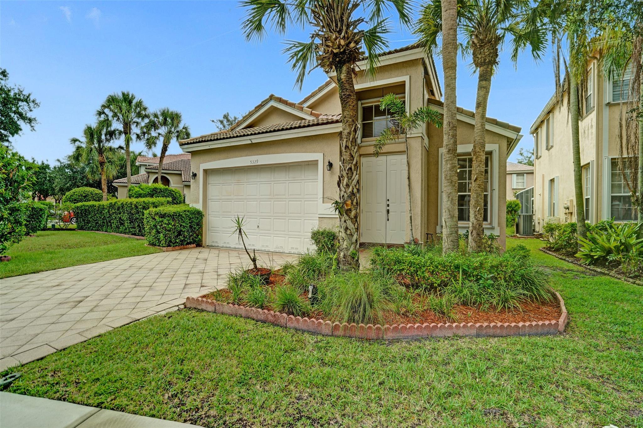 Charming well-maintained 4-bedroom, 2-bathroom home located in the sought-after Mayfair at Wyndham Lakes community. Pool was just resurfaced! Entire home freshly painted! Spacious one-story layout ,Vaulted ceilings, custom made wide wood blinds throughout the house. Sitting on one of the largest lots in the neighborhood, there's plenty of room to enjoy both indoor and outdoor space. Pool has a new motor and pump, offering a fresh and inviting space for relaxation and entertainment. Hurricane accordion shutters all throughout. Largest non easement lot in Mayfair! This gated community is quiet and family-friendly, has a beautiful community pool, low HOA fees and convenient access to top-rated schools, parks, shopping, and major roadways.