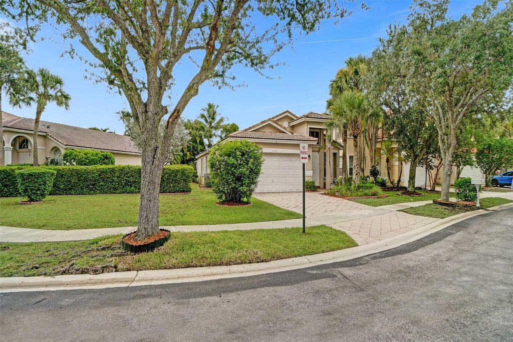Photo of 5329 NW 126th Drive, Coral Springs, FL 33076 (MLS # F10519546)
