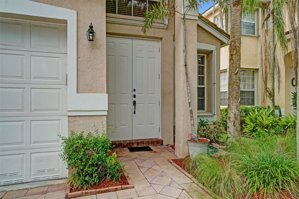Photo of 5329 NW 126th Drive, Coral Springs, FL 33076 (MLS # F10519546)