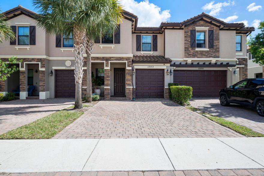 This warm & inviting 3 bedroom, 2.5 bath townhouse with a 1 car garage is located in Cambria Parc, a beautiful, gated community in Central Boynton Beach. The main level features an open-concept living and dining area that flows into the kitchen and outdoor patio. The spacious kitchen is equipped with new stainless steel appliances, upgraded quartz countertops, pantry & espresso colored cabinets. Upstairs, 3 large bedrooms including a primary suite with a builders upgraded private bath & walk-in closet, 2nd full bath & laundry room w/ new washer & dryer. Residents enjoy access to amenities including a secure gate, pool, park, and playground. Conveniently located near shopping, dining, major highways, and area beaches, this is your chance to own in a well-maintained Boynton Beach community.