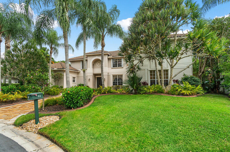 Spectacular Home in the Exclusive manned Gated enclave ''The Island''. This estate was built in1994 with 6 Bedrooms/5 1/2 Bathrooms & Den/Office or Fitness room and a loft upstairs. Open and Spacious, High ceilings, under a newer roof, 2 car garage. FL outdoor living with screened in heated pool and spa. Backyard chill out area. Newer A/Cs. Tennis, Social and Golf memberships available. A very special home for you and your family.