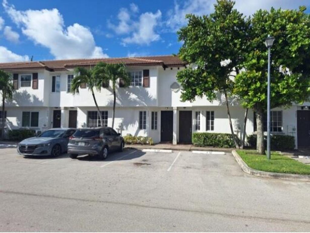 Photo of 4142 Napoli Lake Dr, Riviera Beach, FL 33410 (MLS # R10998062)