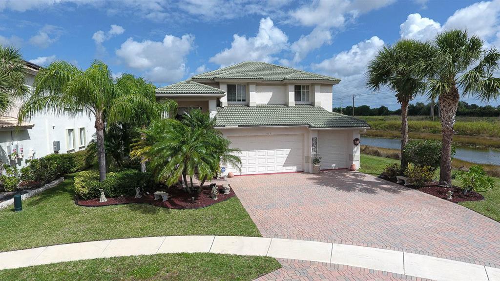 LOCATION, LOCATION LOCATION. CUL-DE-SAC AND WATERFRONT! FEATURES INCLUDE: 4 BEDROOM, 3 BATH, FRESHLY PAINTED WITH ALL NEW CARPETING, SOURING CEILINGS. LARGE WHITE KITCHEN WITH CENTER ISLAND, ALL NEWER STAINLESS SAMSUNG APPLIANCES, PRIVATE (1ST) FIRST FLOOR MASTER SUITE WITH LUXURIOUS BATH, ADDITIONAL BEDROOM AND BATH ON (1ST) FLOOR. SECOND FLOOR LOFT WITH 2 BEDROOMS AND BATH. GENEROUS SCREENED ENCLOSED REAR PAVER PATIO WITH PANORAMIC VIEWS. EXPECT TO BE IMPRESSED!