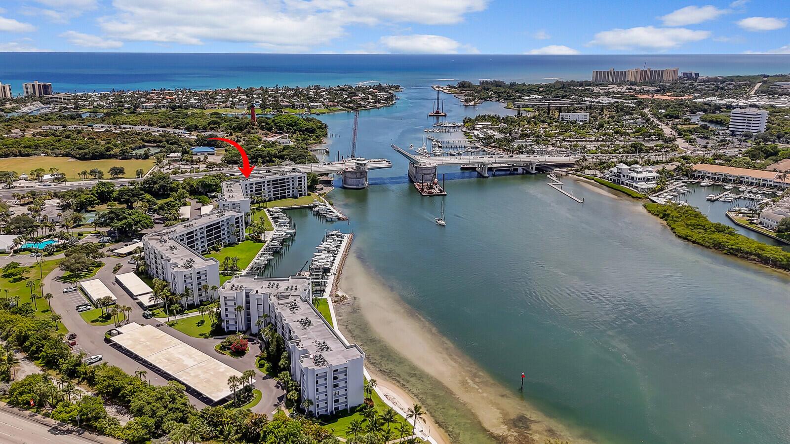 Waterfront Condo with Panoramic Intracoastal Views + Marina Access in Gated Jupiter CommunityEnjoy coastal living at its finest in this updated 2-bedroom, 2-bathroom condo located just steps from the iconic Jupiter Inlet and Lighthouse. This bright, move-in ready residence offers sweeping Intracoastal water views from every room--a rare find at this price point.Situated in a gated waterfront community, this unit gives you direct access to top-tier amenities including a heated resort-style pool, tennis and pickleball courts, clubhouse with dining area, fitness center, Pelican Park, and an on-site property manager for peace of mind.Outdoor enthusiasts will love launching paddleboards or kayaks right from the private tiki hut beach--complete with secure storage. Boaters take...