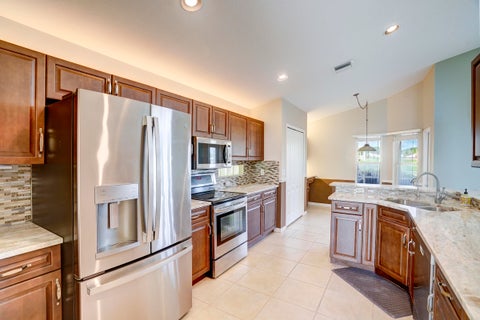Tiny photo for 1117 AVONDALE Court, West Palm Beach, FL 33409 (MLS # B26072128)