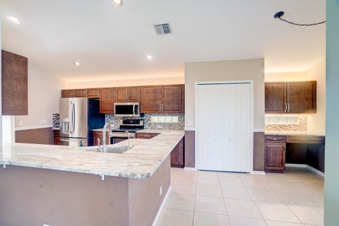 Tiny photo for 1117 AVONDALE Court, West Palm Beach, FL 33409 (MLS # B26072128)