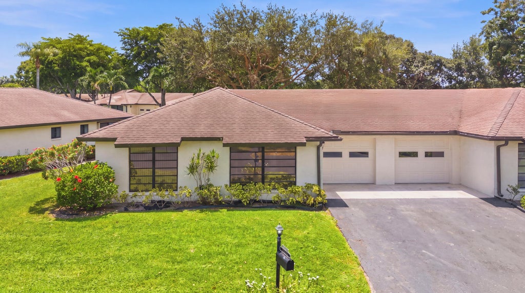 Photo of 4675 ROBINWOOD Circle #A, Boynton Beach, FL 33436 (MLS # B26055035)