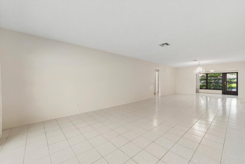 Photo of 4675 ROBINWOOD Circle #A, Boynton Beach, FL 33436 (MLS # B26055035)
