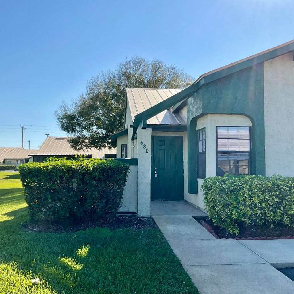 Photo of 680 SW Veronica Avenue, Port Saint Lucie, FL 34953 (MLS # R11149910)