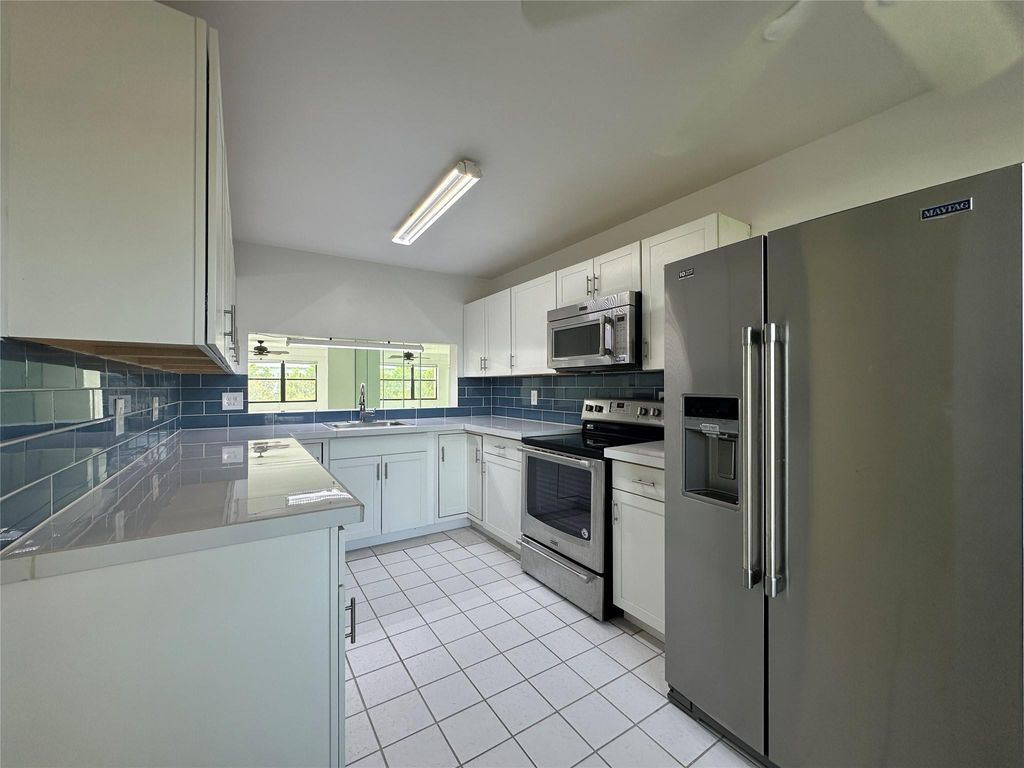 Photo of 7673 Tahiti Lane #105, Lake Worth, FL 33467 (MLS # F10513838)