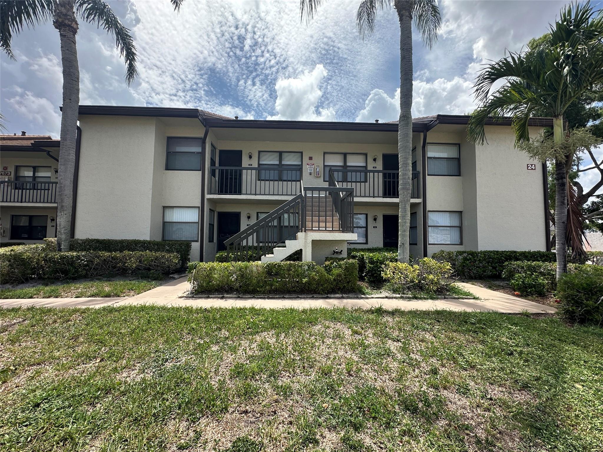 Your Dream Home Awaits You! Beautiful, large 2-bedroom/2-bath-ground-floor condo with split bedroom plan, upgraded baths & kitchen with stainless steel appliances & lots of cabinets, perfect for cooking and entertaining. Tile & laminate flooring offer elegance & easy maintenance. The master bedroom has a huge walk-in closet & opens into a screened patio with a small storage area. The tankless water heater is a plus. Parking apace is steps away from your unit. Lucerne Point has a vibrant, active community designed for resort-style living with 2 pools & 2 clubhouses. Amenities include tennis, shuffleboard, & billiards, Close to the Turnpike, beach, shopping, dining & entertainment. Call this move-in-ready gem your own! It's a lifestyle upgrade!