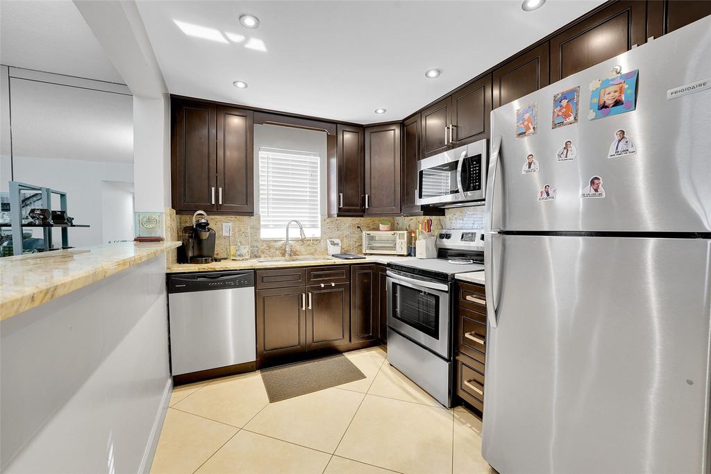 Photo of 4157 NW 90th Avenue #101, Coral Springs, FL 33065 (MLS # F10493084)