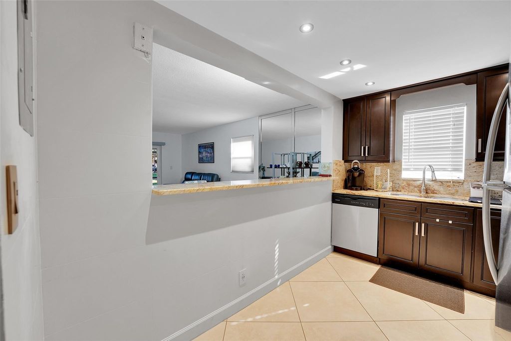 Photo of 4157 NW 90th Avenue #101, Coral Springs, FL 33065 (MLS # F10493084)