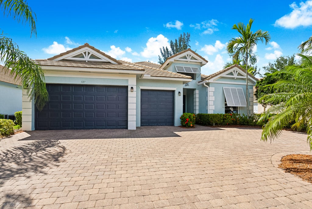 Photo of 127 PALM BEACH PLANTATION Boulevard, West Palm Beach, FL 33411 (MLS # B26077689)