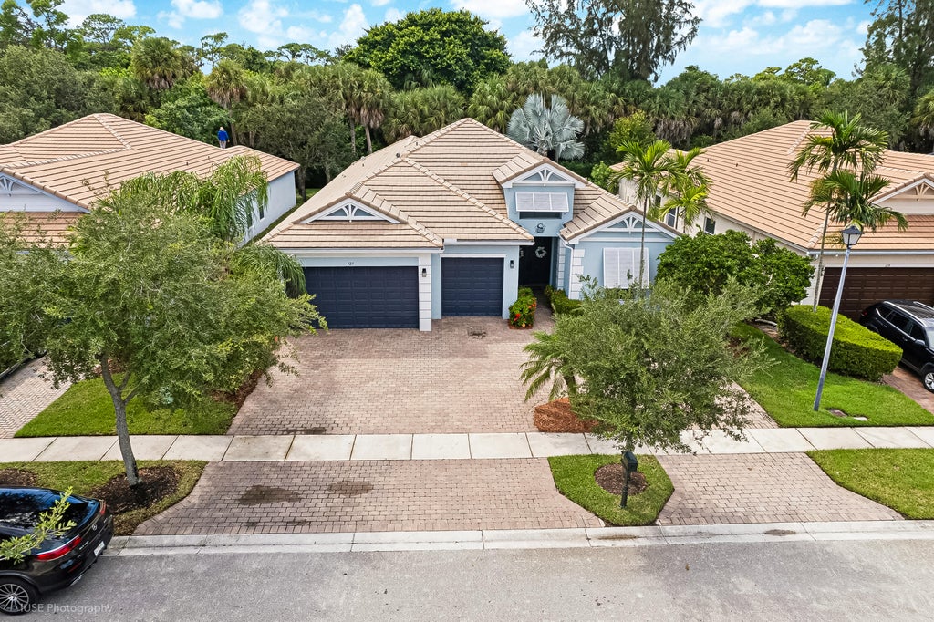 Photo of 127 PALM BEACH PLANTATION Boulevard, West Palm Beach, FL 33411 (MLS # B26077689)