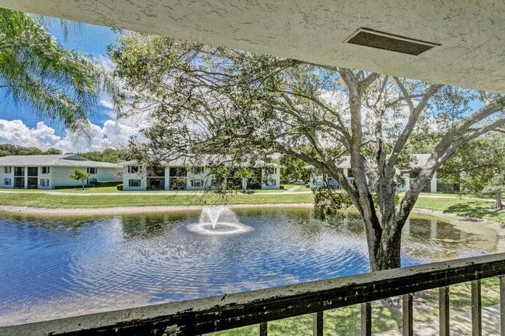 THIS 2 BEDROOM 2 BATH UNIT HAS BEEN TOTALLY RE-DONE NEW PORCELAIN TILE FLOORS THROUGHOUT , NEW KITCHEN APPLIANCES INCLUDING A WASHER AND DRYER IN UNIT,NEW CEILING FANS ,ALL GLASS SHOWER DOORS .STORAGE ROOM IN UNIT WITH HUGE WALK IN CLOSETS. OVER LOOKING A PICTURESQUE LAKE FROM YOUR SCREENED IN PATIO. CATHEDRAL CEILINGS .SPLIT BEDROOMS , POOL, ASSIGNED PARKING,TENNIS 5 MINUTES TO SHOPPING, RESTAURANTS, AND ENTERTAINMENT.