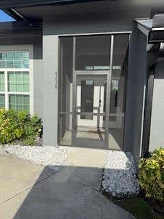 Photo of 4238 SW Ragen Street, Port Saint Lucie, FL 34953 (MLS # R11109169)
