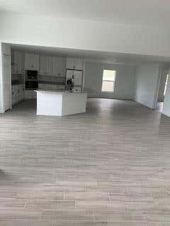 Photo of 4238 SW Ragen Street, Port Saint Lucie, FL 34953 (MLS # R11109169)