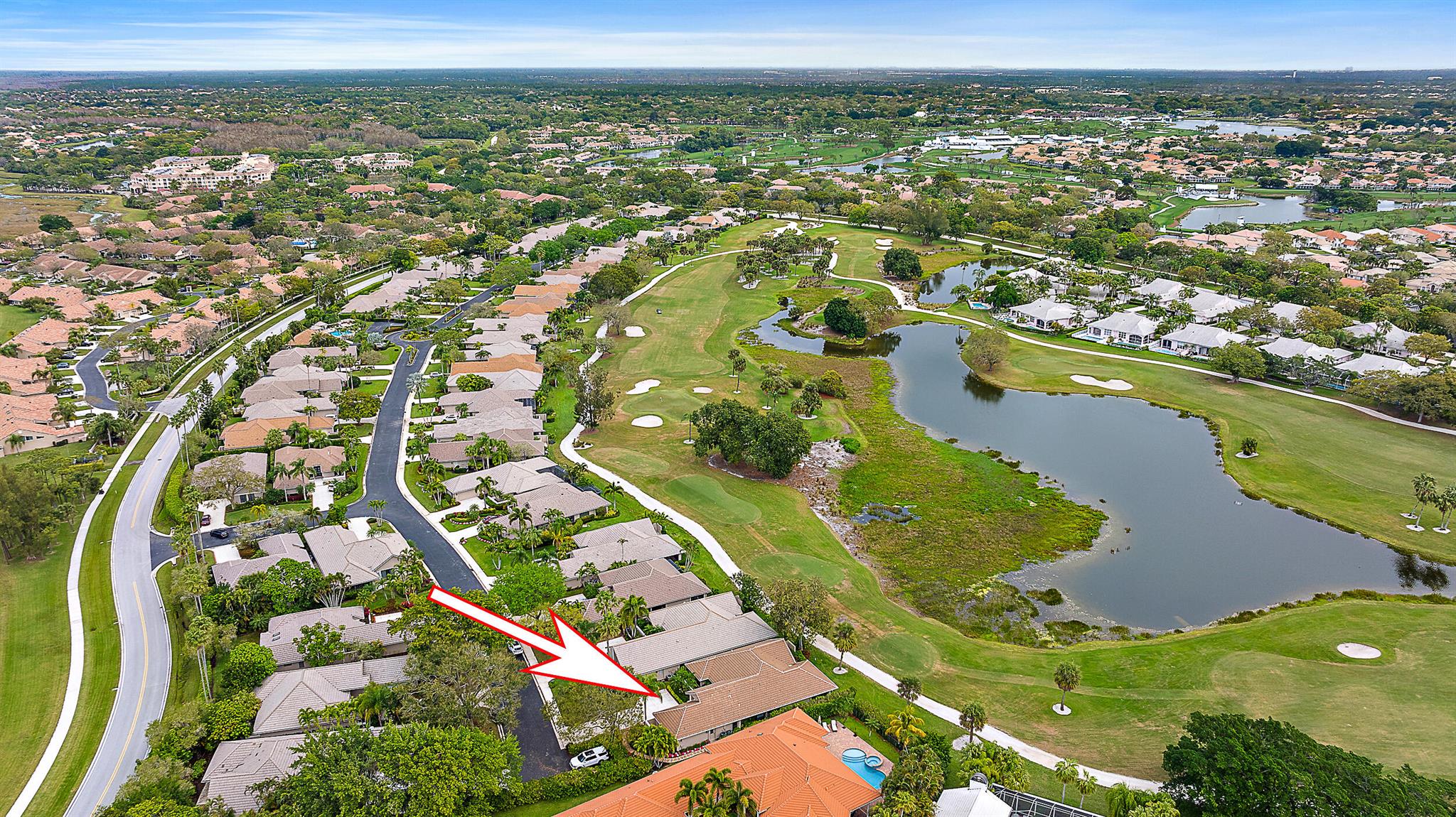 One of the best locations in PGA National! This incredible home in Coventry is situated on a tranquil lake separating two fairways plus an expansive nature habitat for birds by day & gives off a dazzling twinkle at dusk. This 3-beds+den, 2.5-bath 1-story home has tons of storage in kitchen, an oversized 2-car garage, & large Master Suite + walk-in closet combo. Residents can join the club and enjoy golf, tennis, pickleball, croquet, spa facilities, & fine dining--plus Coventry's private pool & community space, perfect for gatherings or quiet relaxation. Exceptional privacy at the end of a quiet street with 2 peaceful outdoor spaces. A gated courtyard style entrance & large, screened lanai out back - the ultimate way to do South Florida.