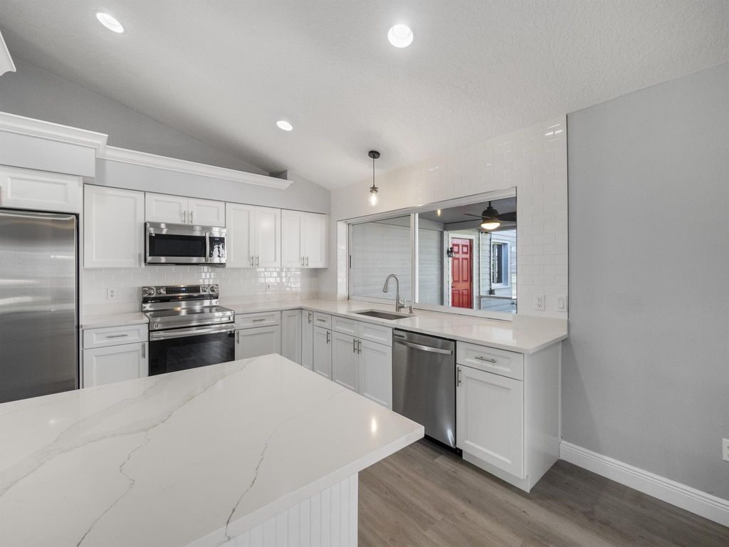 Photo of 1533 SW Fortune Road, Port Saint Lucie, FL 34953 (MLS # R10944628)