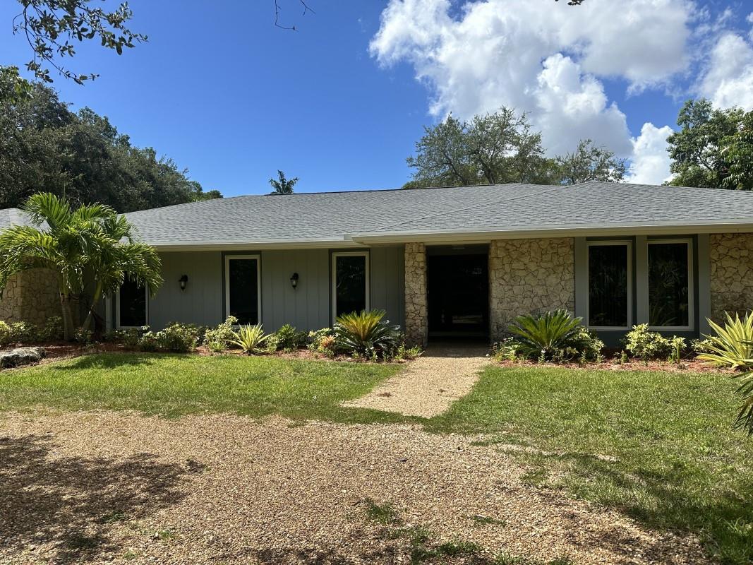 This expansive 36,155 sq ft fully fenced ranch home offers 5-bedroom, 2-bath home features impact windows and doors, and a new roof, A/C indoor laundry room, walk in master closet, pool, garage is converted into 5th room which came be gameroom or den. A rare opportunity in a neighborhood surrounded by beautifully updated and newly constructed homes and lush trees.