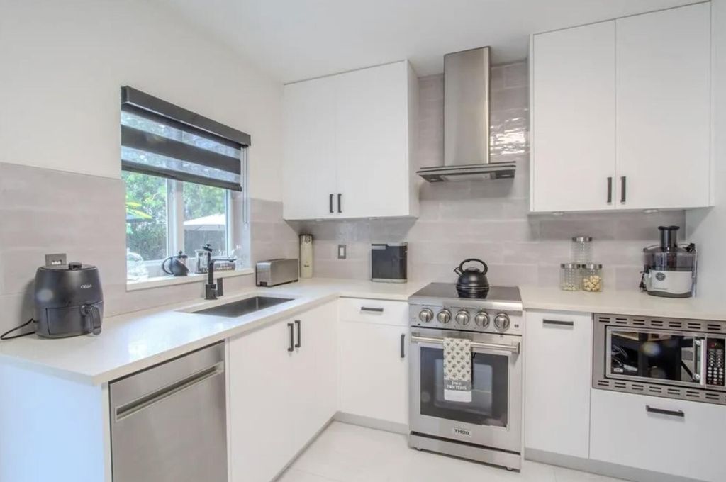 Photo of 1032 SW 15th Terrace, Fort Lauderdale, FL 33312 (MLS # B26005637)