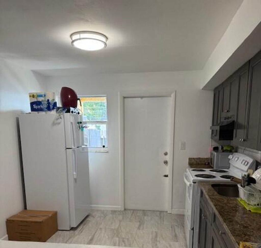 Photo of 1008 N 6th Avenue, Lake Worth Beach, FL 33460 (MLS # R11116821)