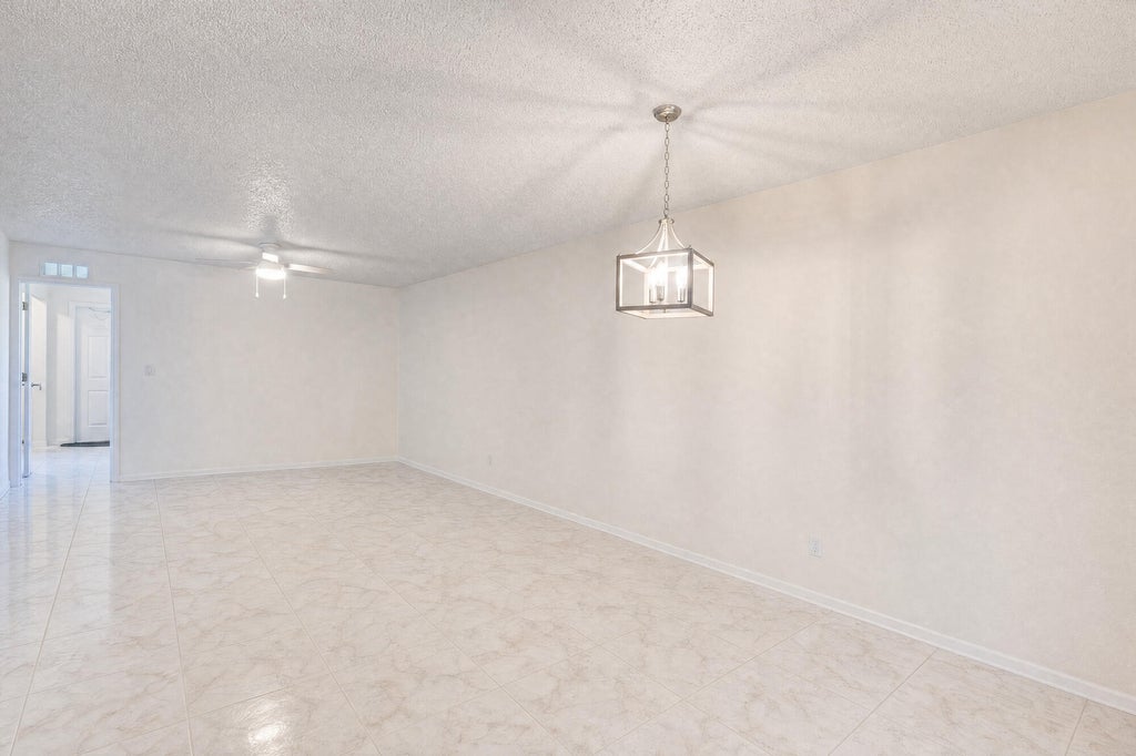 Photo of 2825 SW 22nd Avenue #Apt 107, Delray Beach, FL 33445 (MLS # B26080698)