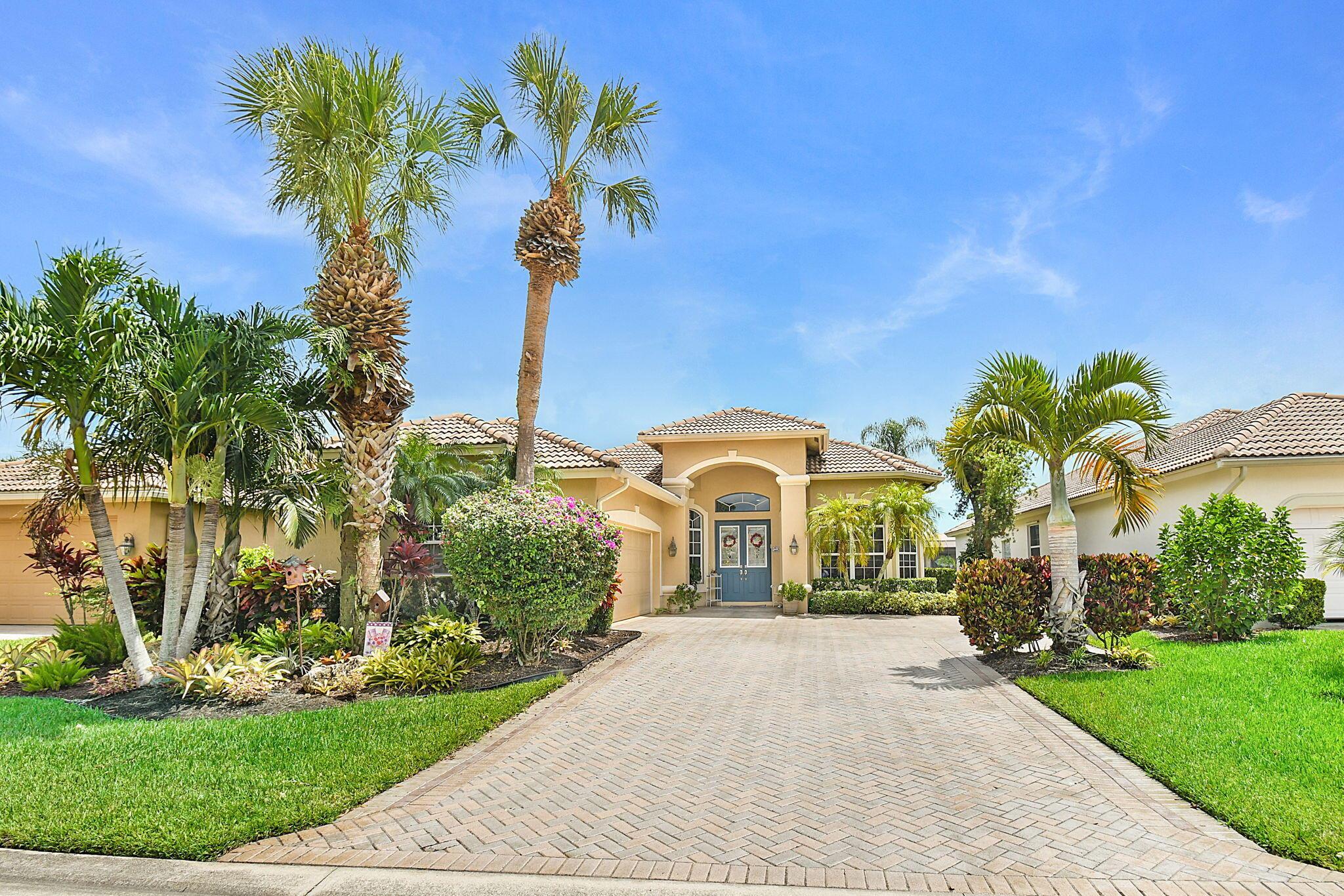 Seeking a home with a water view...in a gated community...with access to optional golf and social memberships? Need a space where you can have room to entertain large groups? I've got the perfect match for you. This is a one-owner home presented with obvious pride of ownership and a warmth that grabs you as soon as you walk in. The claim to fame is that this was the first home built behind the South Gate of PGA Village back in 2000. This Seller has seen decades of changes through the walls of this home, and now they are ready to pass it on to another family that will make new memories.
