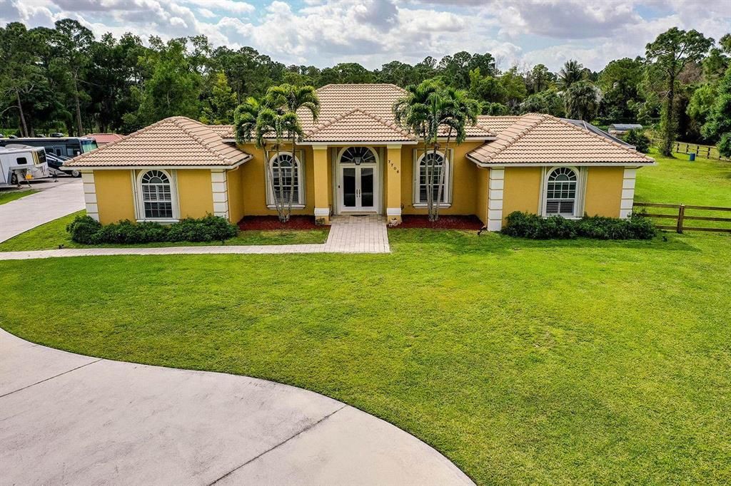 Photo of 7706 160th Lane N, West Palm Beach, FL 33418 (MLS # R10715265)