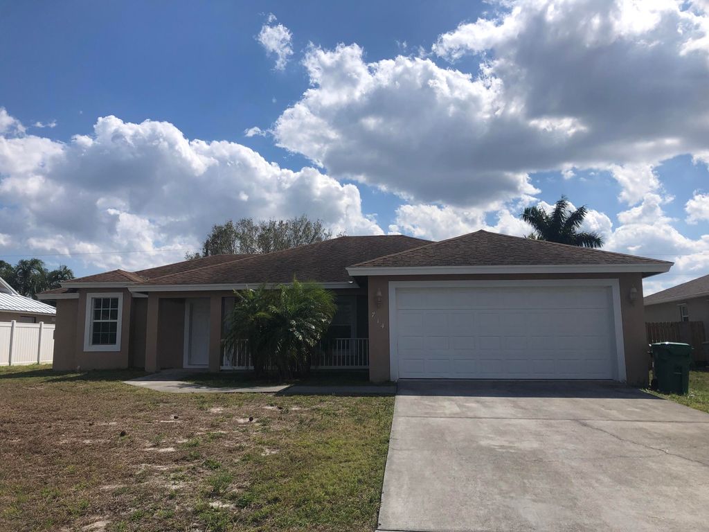 Photo of 714 SE Elwood Avenue, Port Saint Lucie, FL 34983 (MLS # R10780289)