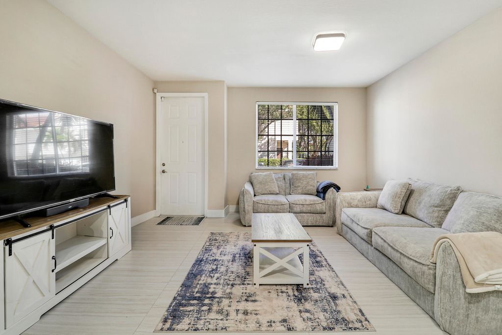 Photo of 4170 Napoli Lake Drive, Riviera Beach, FL 33410 (MLS # R11161074)