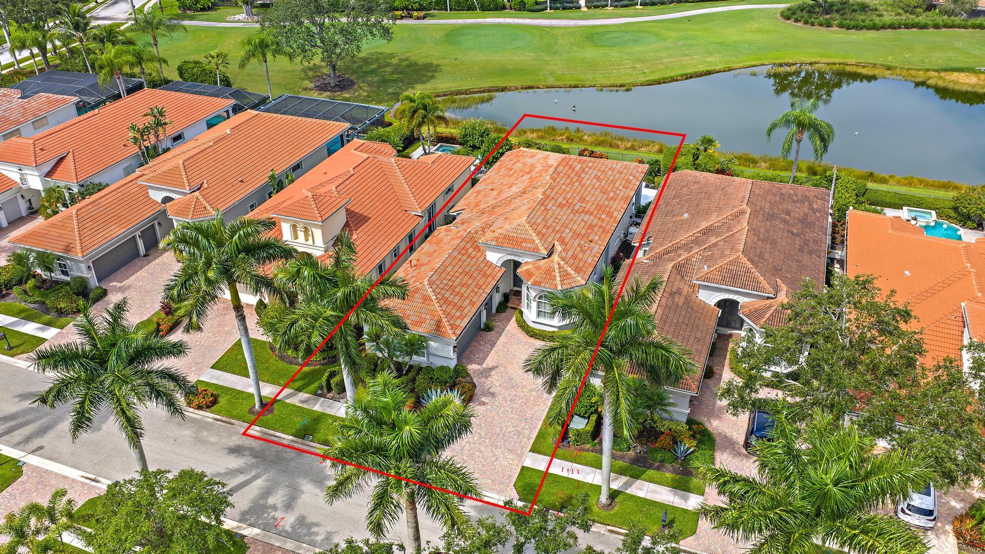 Featuring one of the most open floor plans in The Club at Ibis and situated on a premium water and golf lot, this 3BR/3BA+Den boasts beautiful renovations and upgrades. With 50 feet of water frontage, this ''Portofino'' model features a NEW ROOF (2023), Accordian hurricane Shutters, and a completely renovated pool, spa and patio area featuring sandblasted marble decking. Overlooking the 17th hole of the Tradition Course, this home offers incredible vistas of water and golf. Enjoy spectacular sunsets every night from the west-facing backyard.