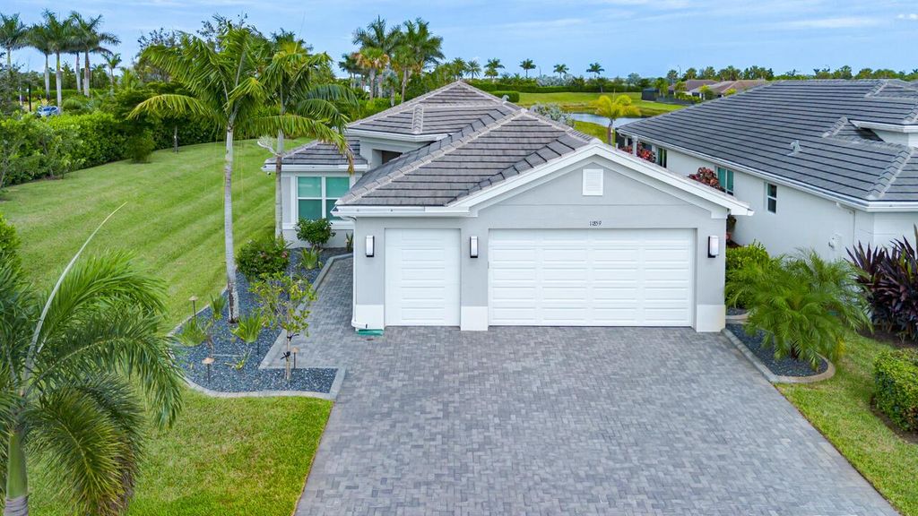 Photo of 11859 SW Paradise River Road, Port Saint Lucie, FL 34987 (MLS # R11118430)