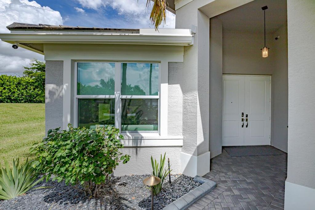 Photo of 11859 SW Paradise River Road, Port Saint Lucie, FL 34987 (MLS # R11118430)