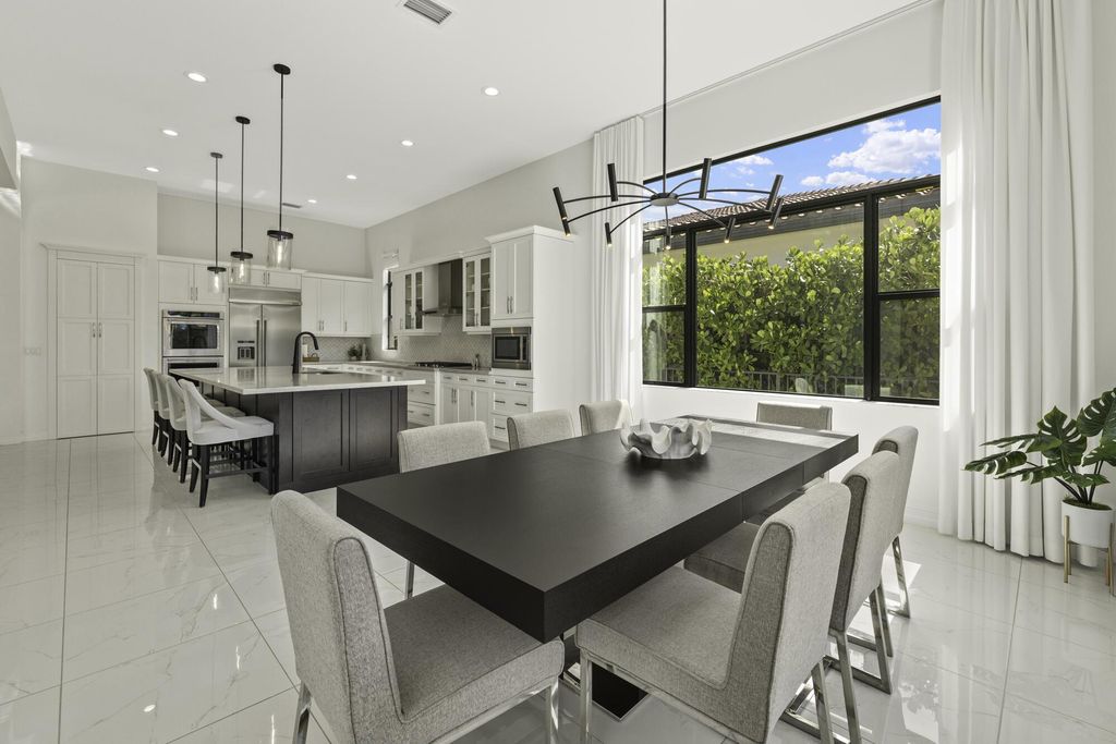 Photo of 9291 Grand Prix Lane, Boynton Beach, FL 33472 (MLS # R11110163)