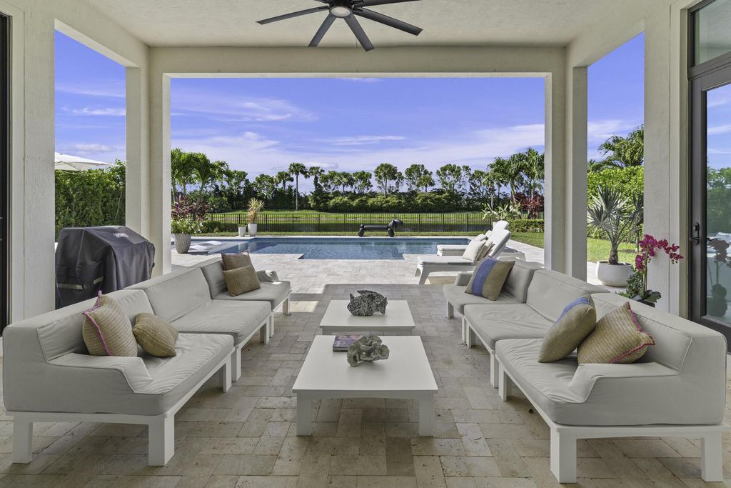 Photo of 9291 Grand Prix Lane, Boynton Beach, FL 33472 (MLS # R11110163)