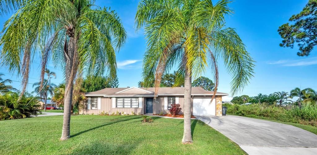 Photo of 1101 SW Irving Street, Port Saint Lucie, FL 34983 (MLS # R10817622)