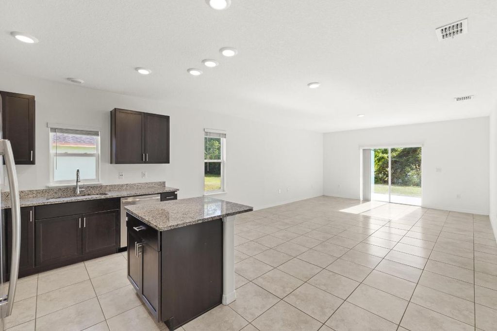 Photo of 1334 SW Kapok Avenue, Port Saint Lucie, FL 34953 (MLS # R11148225)