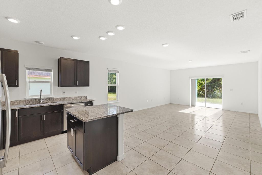 Photo of 1334 SW Kapok Avenue, Port Saint Lucie, FL 34953 (MLS # R11148225)