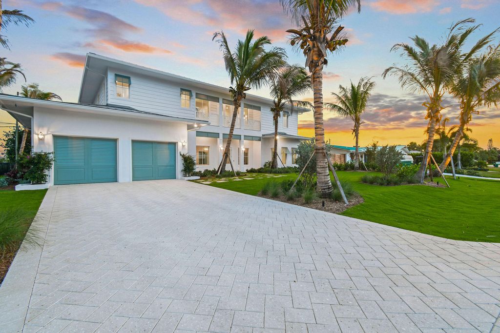 Photo of 91 Golfview Drive, Tequesta, FL 33469 (MLS # B26028226)