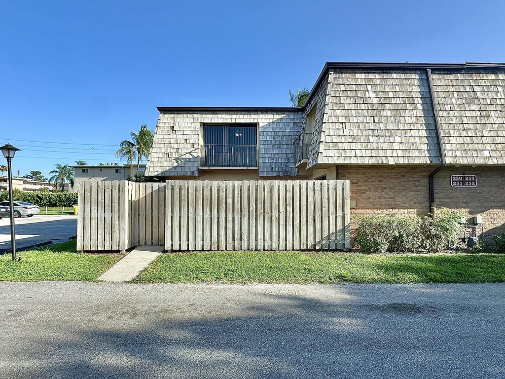 Photo of 251 Lake Arbor Drive, Palm Springs, FL 33461 (MLS # B26050309)