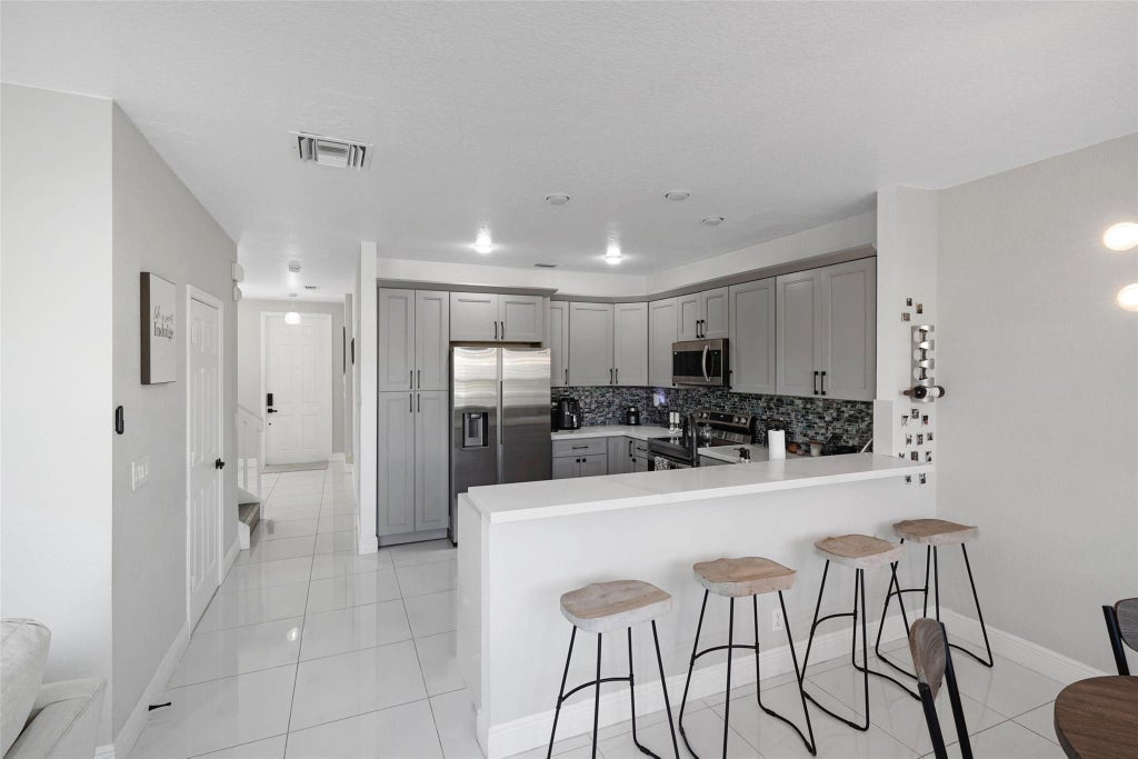 Photo of 3220 NW 32ND Terrace, Oakland Park, FL 33309 (MLS # B26081062)