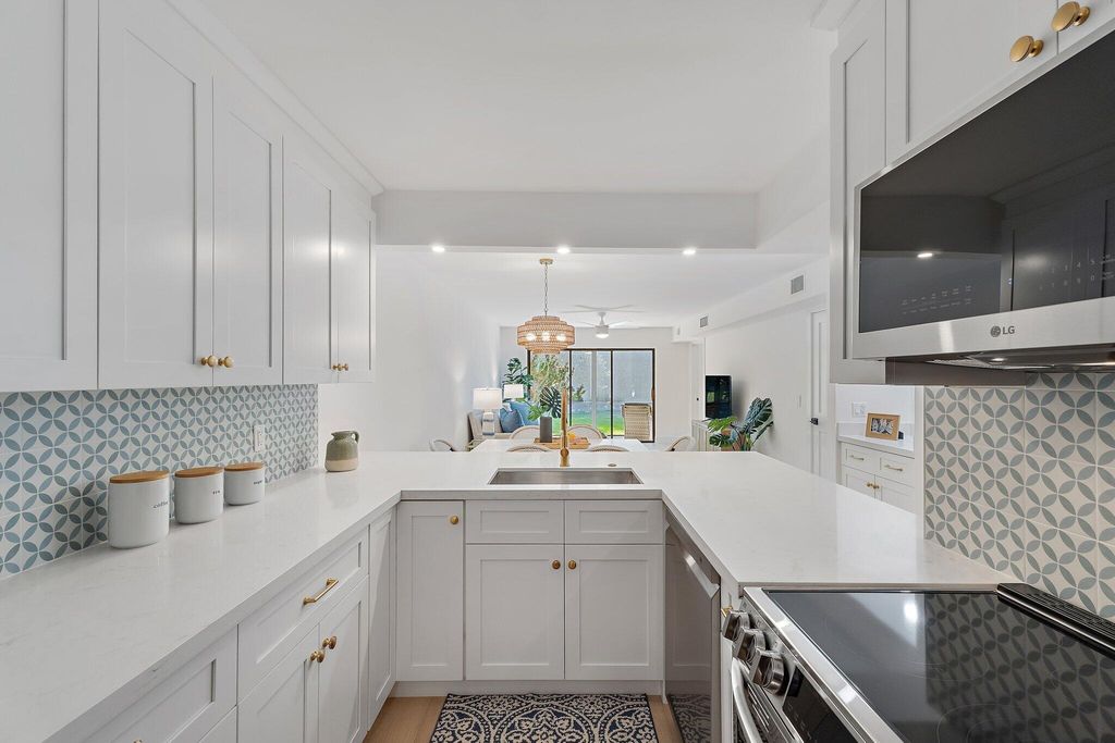 Photo of 1141 Keystone Drive N #D, Jupiter, FL 33458 (MLS # R11123409)